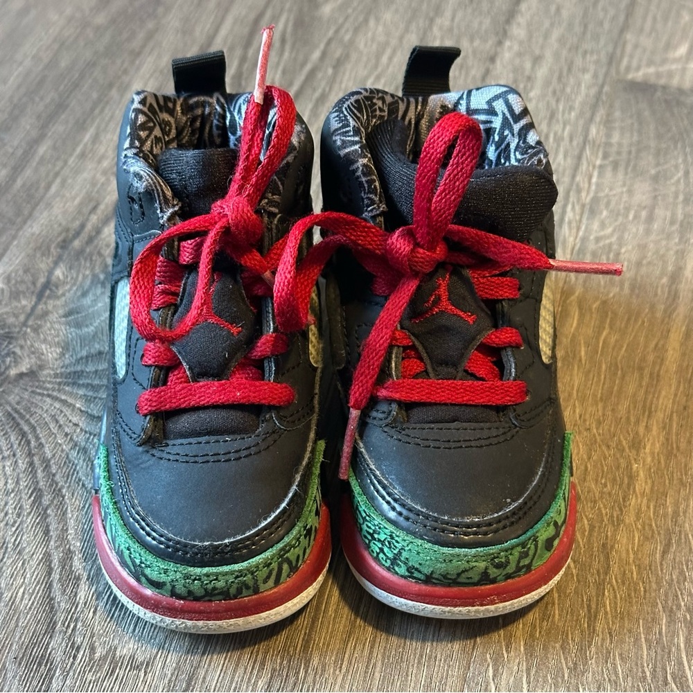 Nike Kids Black and Red Sneakers with Green Accents